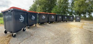 Commercial wastebins in a row